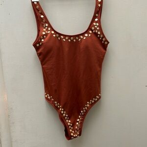 Rust Shade One Piece Bathing Suit With Gold Rhinestones.